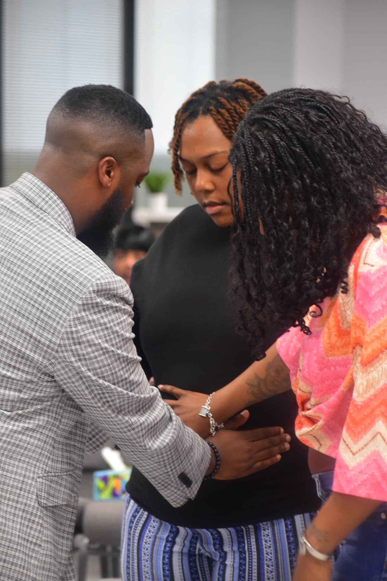 Praying together during ministry
