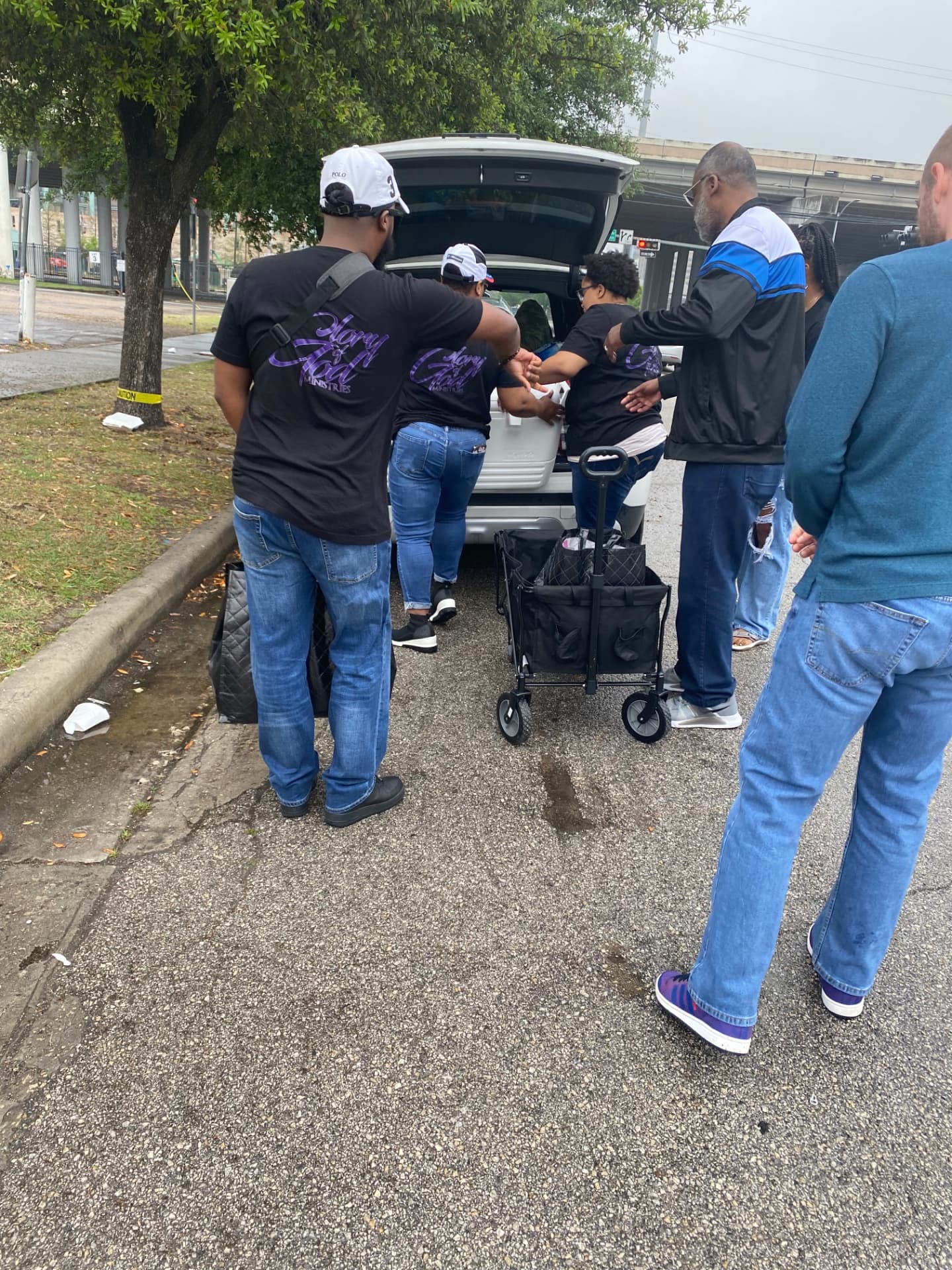 Outreach team loading supplies to serve