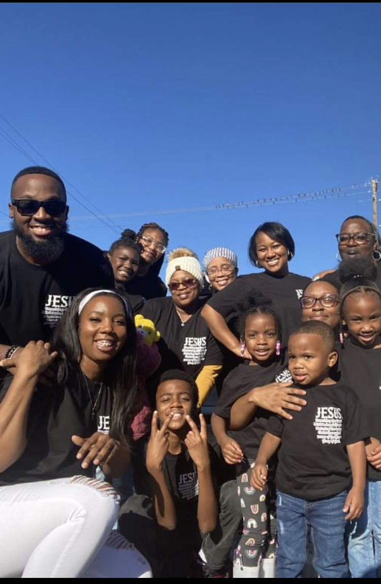 Church family wearing Jesus shirts